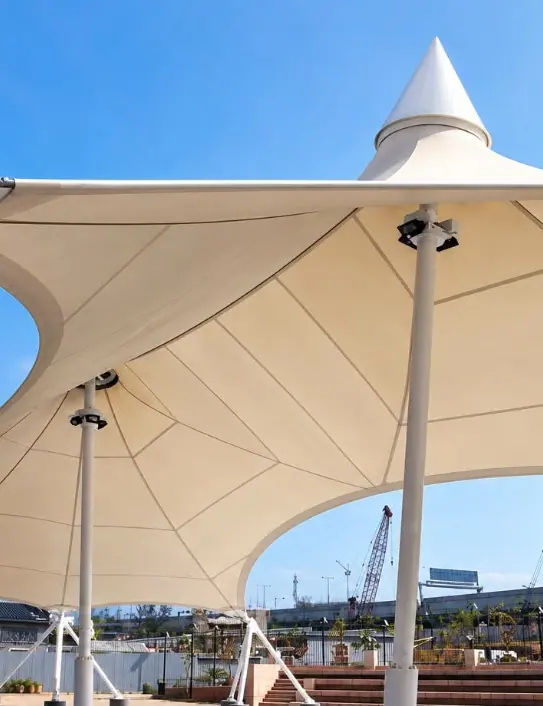 White tensile canopy over outdoor amphitheater seating