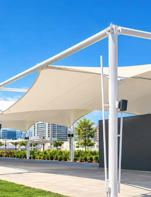 White canopy beside a building