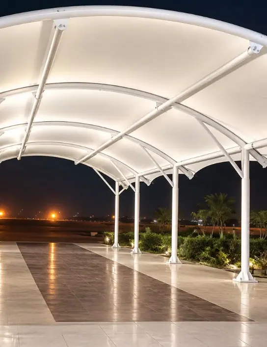 White canopy illuminated at night