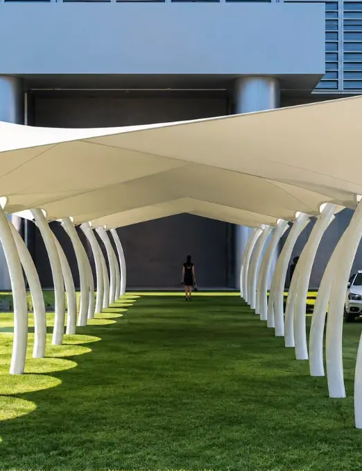 Repeated shade structures along a walkway